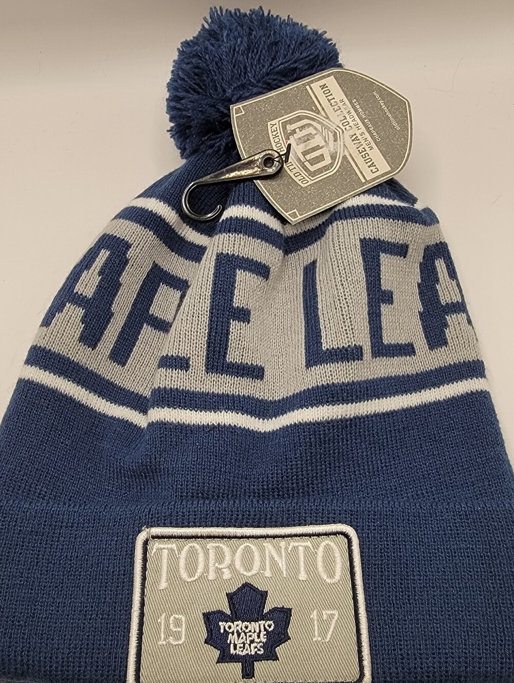 Navy and Gray Pom Beanie - Official NHL Knit Hat